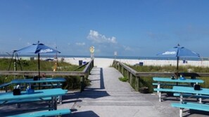 On the beach, sun-loungers, beach towels
