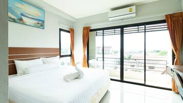 Deluxe Double Room, Balcony | Desk, blackout curtains, free WiFi