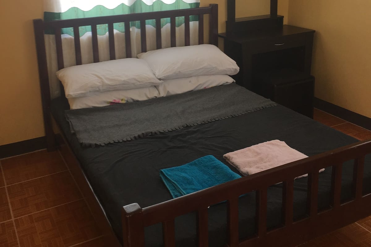 Family Room, 1 Bedroom, Garden View, Corner | Laptop workspace, bed sheets