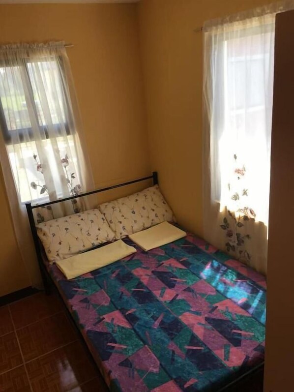 Economy Double or Twin Room, 1 Bedroom, Mountain View | Laptop workspace, bed sheets - Pines Mansion (Butuan)