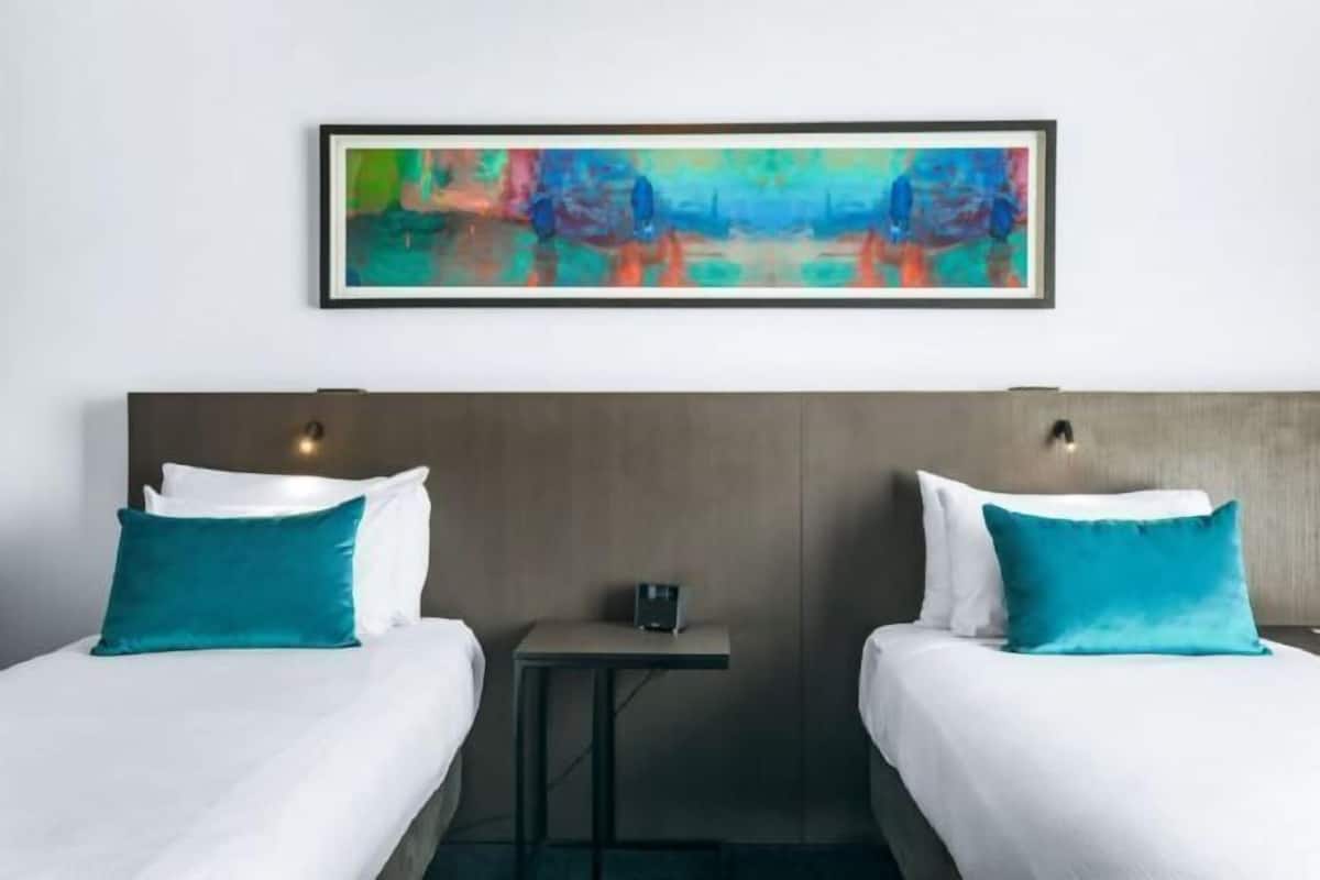 Pillow-top beds, in-room safe, blackout curtains, iron/ironing board