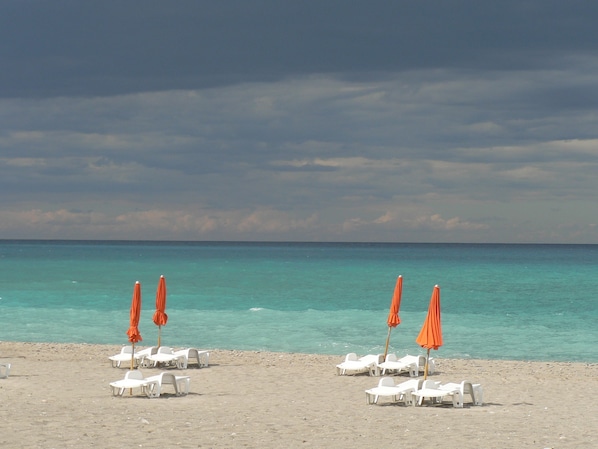 Private beach, sun-loungers, beach umbrellas, beach bar