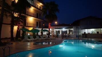 Seasonal outdoor pool, pool umbrellas, sun loungers