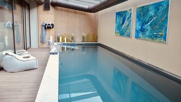 Indoor pool, seasonal outdoor pool, pool umbrellas, sun loungers