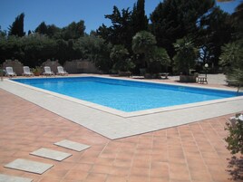 Seasonal outdoor pool, open 8 AM to 7 PM, sun loungers