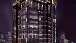 A modern high-rise building with multiple floors and large windows, likely a hotel or office building. - Maline Exclusive Serviced Apartments (Phnom Penh)