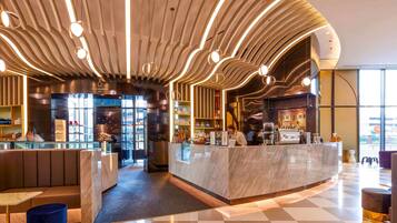 Breakfast, lunch, dinner served; local and international cuisine