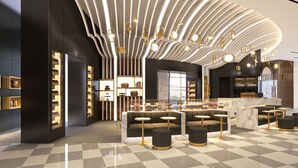 A modern interior with a curved ceiling, bar area, seating, and display shelves. - ibis Styles Ambassador Seoul Yongsan - Seoul Dragon City (Seoul)