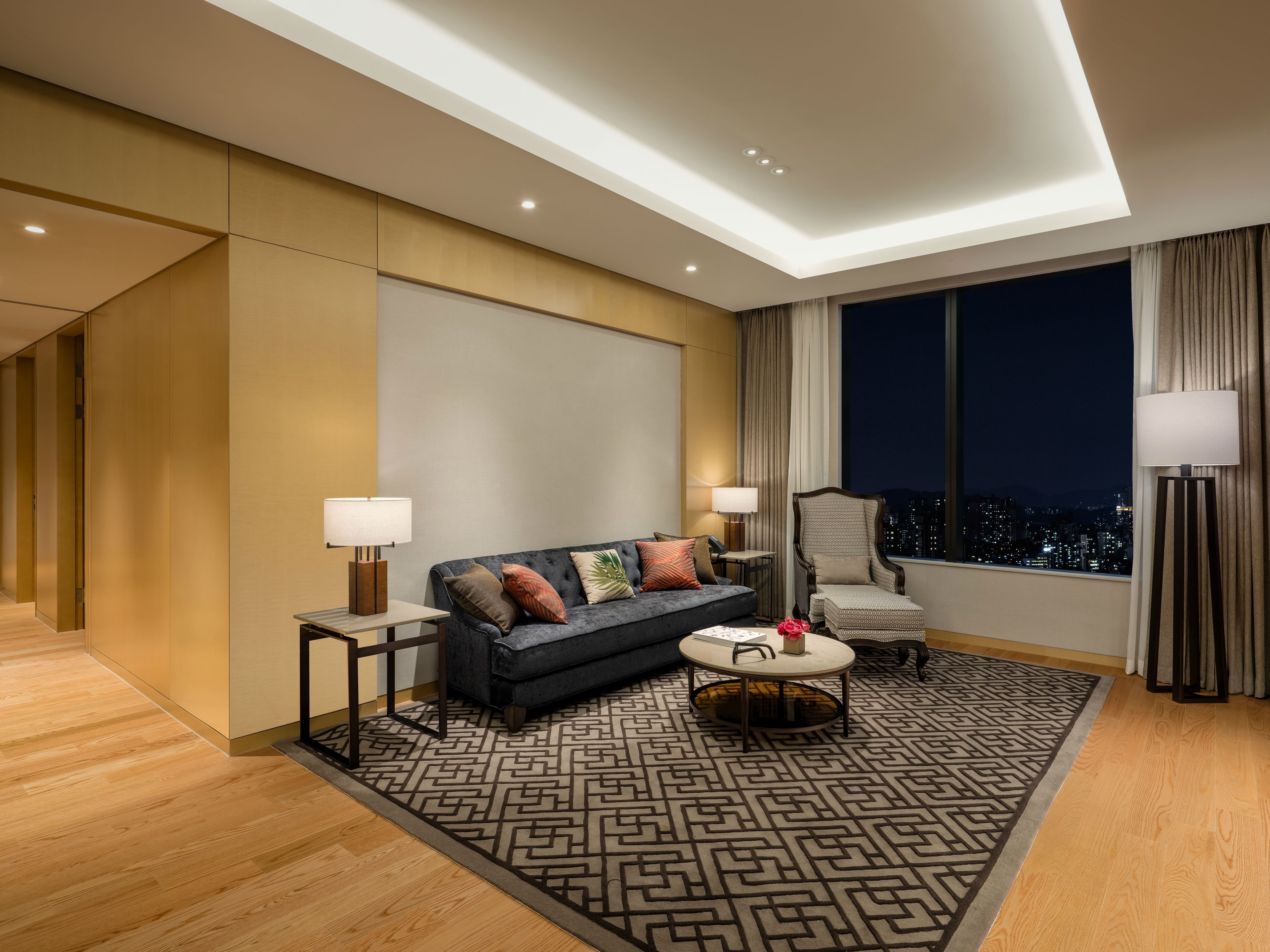 premier suite, 3 bedrooms | living room | 55-inch led tv with cable channels, tv, tablet