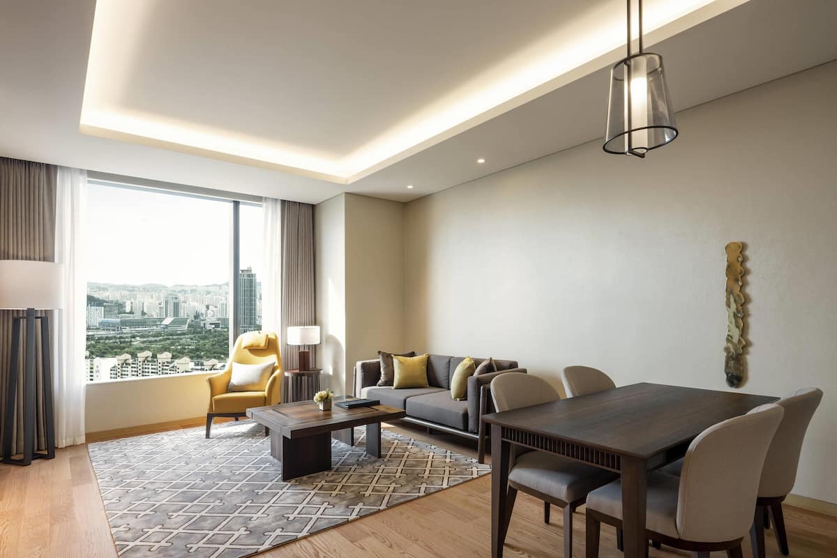 Deluxe Suite, 1 Bedroom | 1 bedroom, premium bedding, down comforters, in-room safe