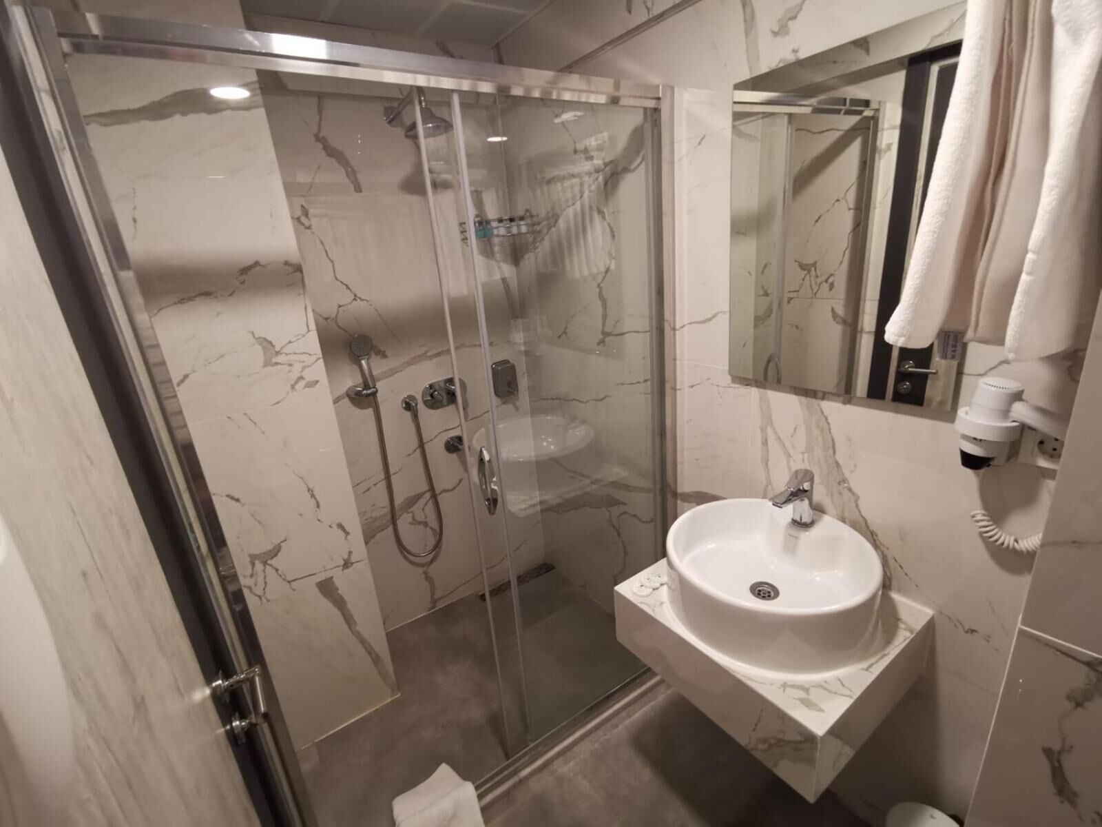 free toiletries, hair dryer, slippers, towels