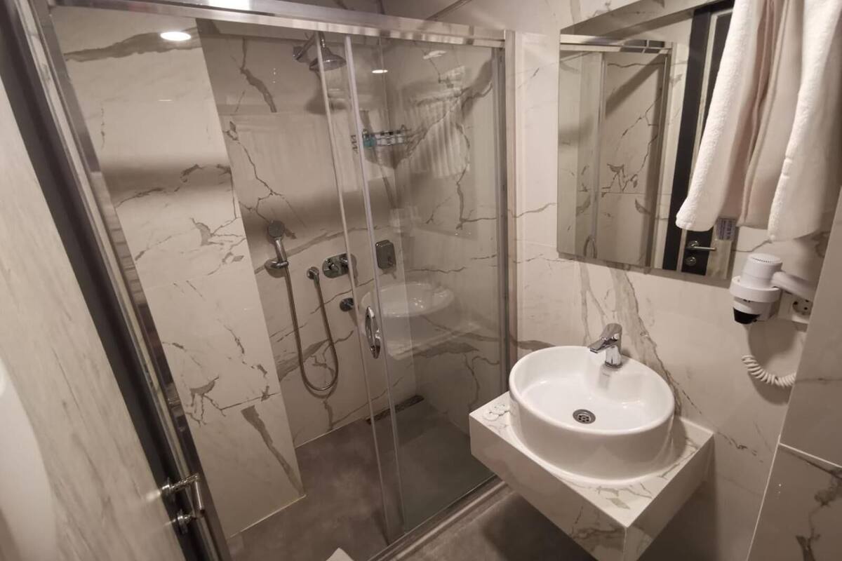 free toiletries, hair dryer, slippers, towels