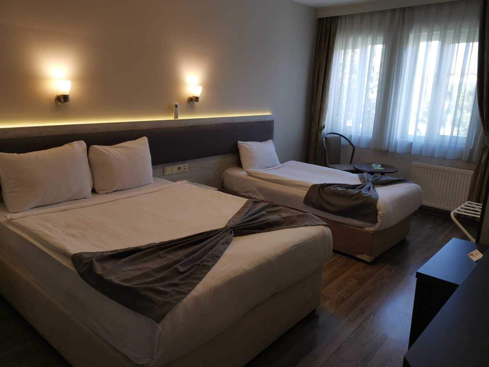 family triple room, multiple beds | desk, laptop workspace, soundproofing, free wifi