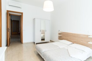 Apartment, 4 Bedrooms (Via Anastasio II, 167) | 4 bedrooms, down duvets, individually decorated, individually furnished