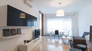 Apartment, 4 Bedrooms (Via Anastasio II, 167) | Living area | 40-inch flat-screen TV with digital channels, TV - House in the city (Rome)