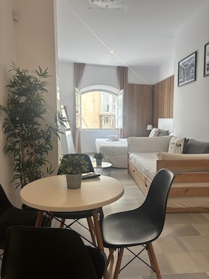 Deluxe Apartment | Living area | Smart TV