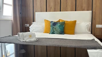 Standard Apartment | Down comforters, memory foam beds, desk, laptop workspace