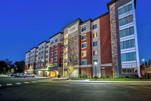 A multi-story hotel with a brick facade, multiple windows, and a sign indicating it is a Marriott hotel. - Residence Inn by Marriott Blacksburg-University (Blacksburg)