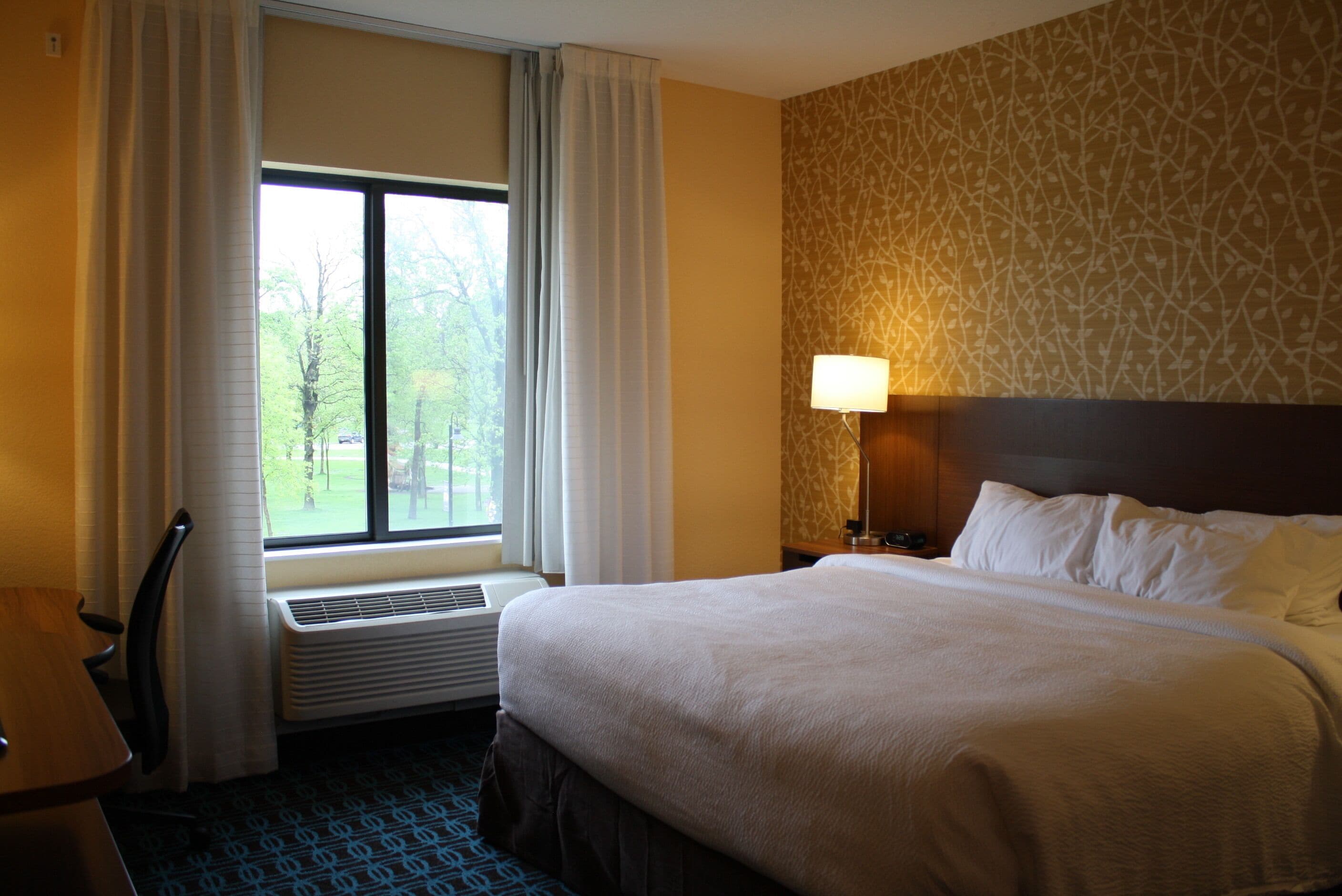 Hypo-allergenic bedding, blackout drapes, iron/ironing board