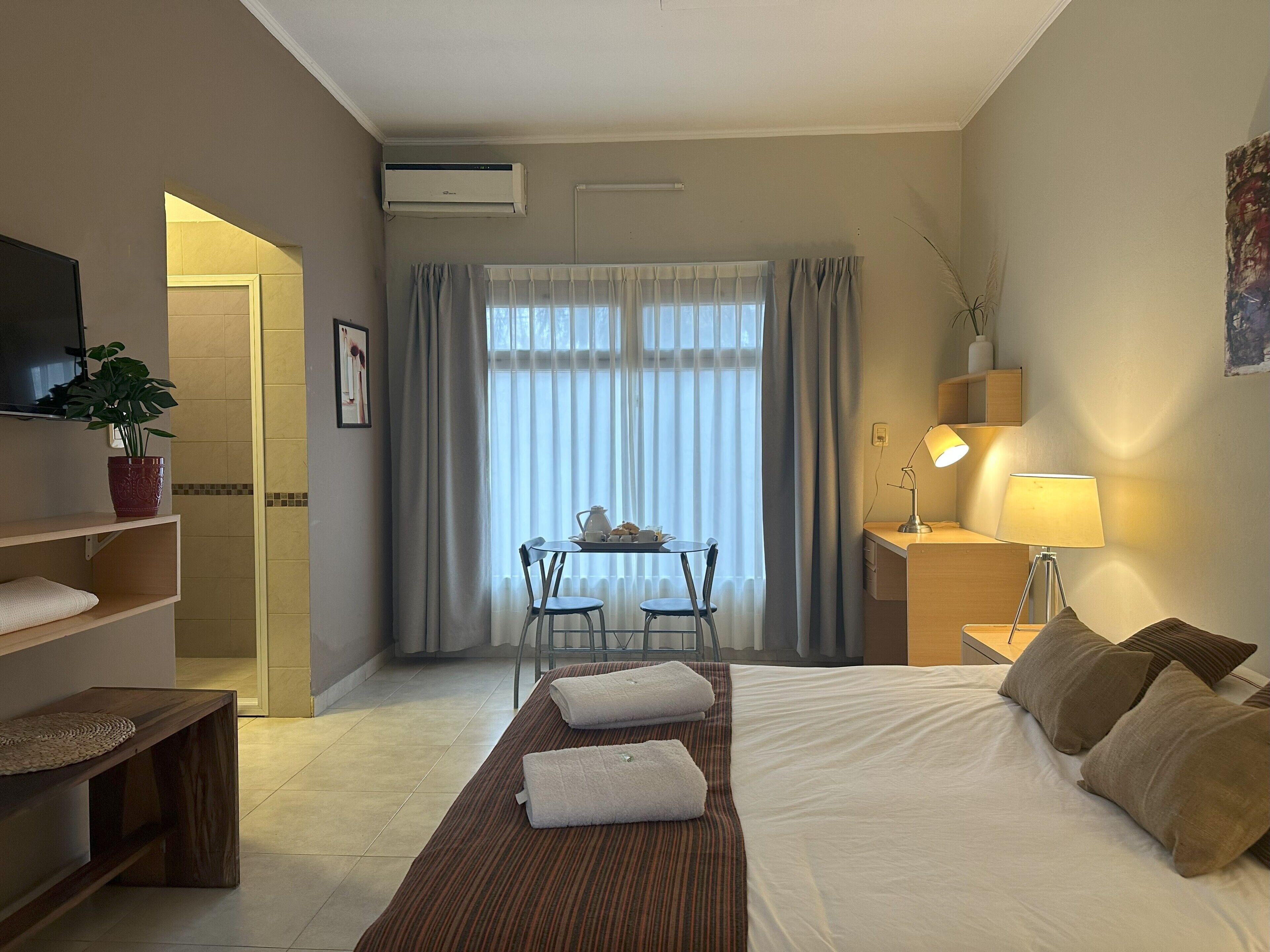 Executive Suite | Blackout drapes, iron/ironing board (on request), individually furnished