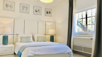 3 habitaciones, tabla de planchar con plancha y cuna de viaje