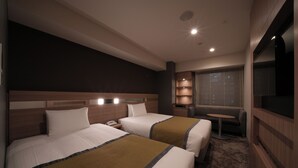 A hotel room with two beds, a small table, a TV, and a window with a city view. - Almont Hotel Sendai (Sendai)