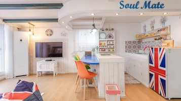 Superior Double Room, 1 Bedroom, Sea View | Living area | 50-inch flat-screen TV with cable channels, TV