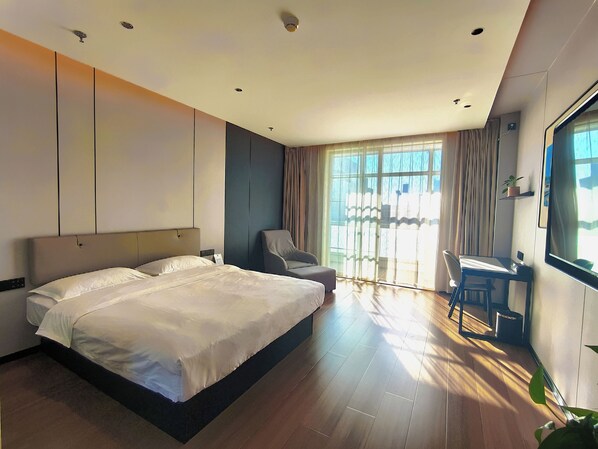 Chambre Élite | Literie de qualité supérieure, coffres-forts dans les chambres, bureau