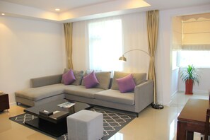 Suite Exécutive | Coin séjour | Télévision LCD