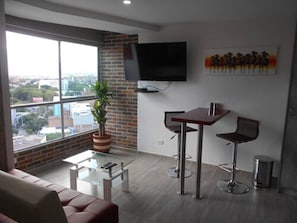 Standard Apartment, 1 Double Bed | Living area | Flat-screen TV - San Peter Suites (Medellín)