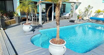 Appartement en rez de chaussée, atypique, 2 chambres, piscine privée