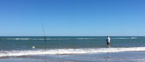 On the beach, sun-loungers, beach towels