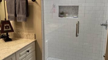 Shower, hair dryer, towels, soap