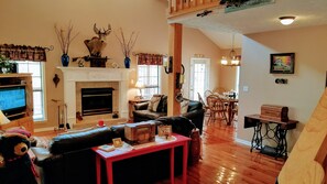 Smart TV, fireplace, DVD player, books