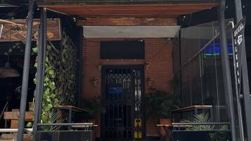 Double Room | Living area | 40-inch plasma TV with cable channels, TV, DVD player