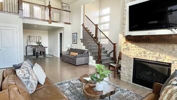 Smart TV, fireplace, DVD player, foosball