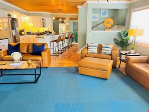 Smart TV, fireplace, books, computer monitors