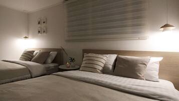 Deluxe Quadruple Room (Foreigner Only, Must notify the hotel of your check-in time) | Premium bedding, WiFi (free), bed sheets