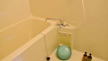 Separate bathtub and shower, free toiletries, hair dryer, bathrobes