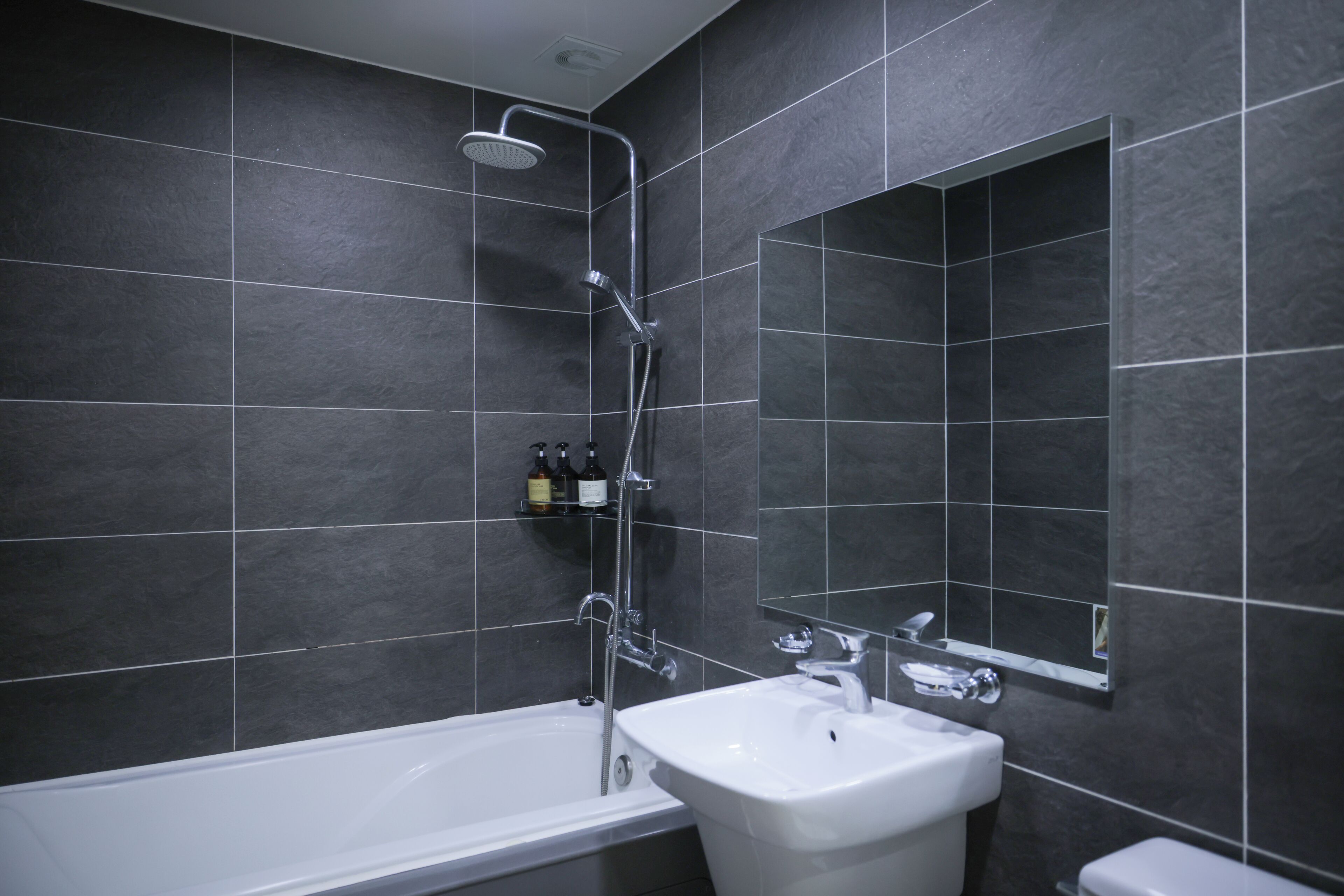 twin room, 2 queen beds | bathroom | free toiletries, hair dryer, bathrobes, slippers