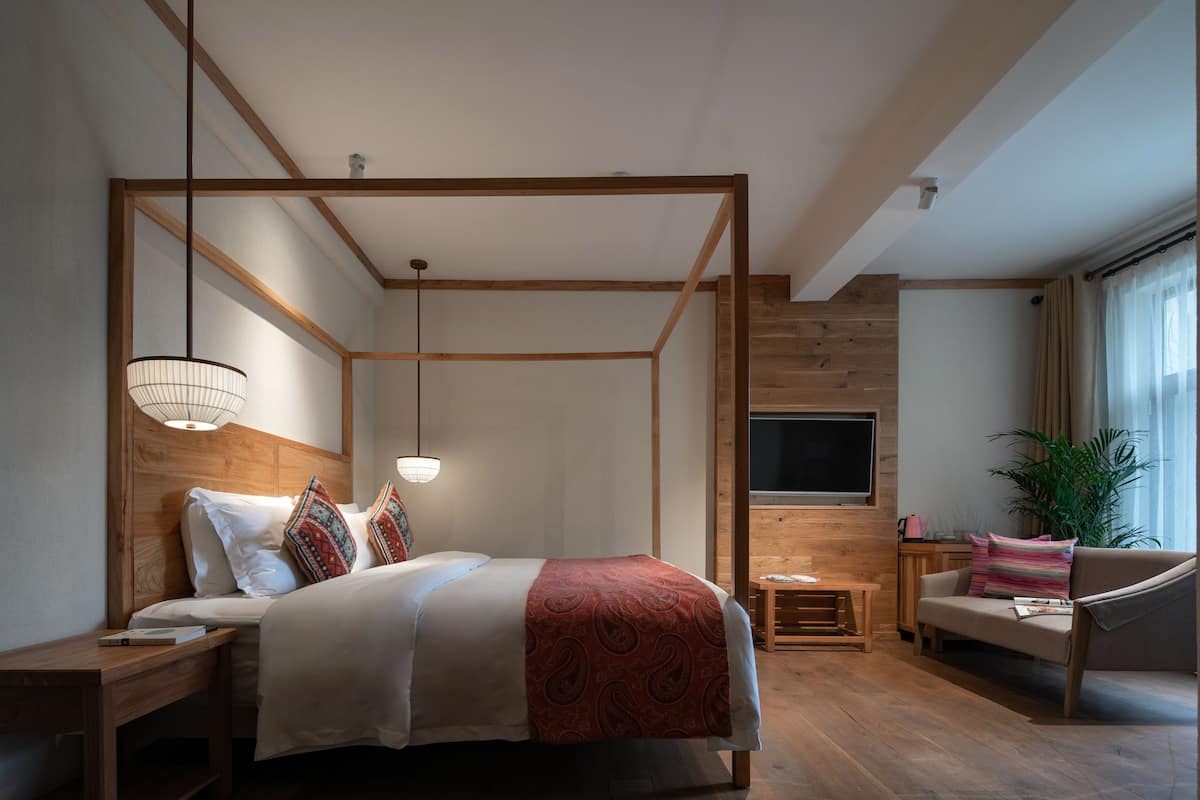 Queen Room With Pool view | Free minibar, in-room safe, individually decorated, desk