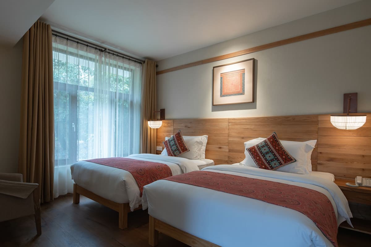 Family Room With Balcony | Free minibar, in-room safe, individually decorated, desk