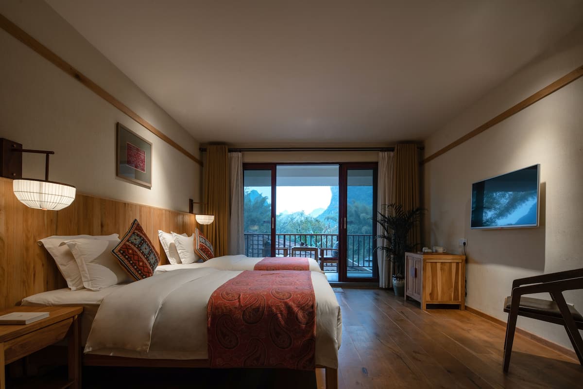 Twin Room With Balcony | Free minibar, in-room safe, individually decorated, desk