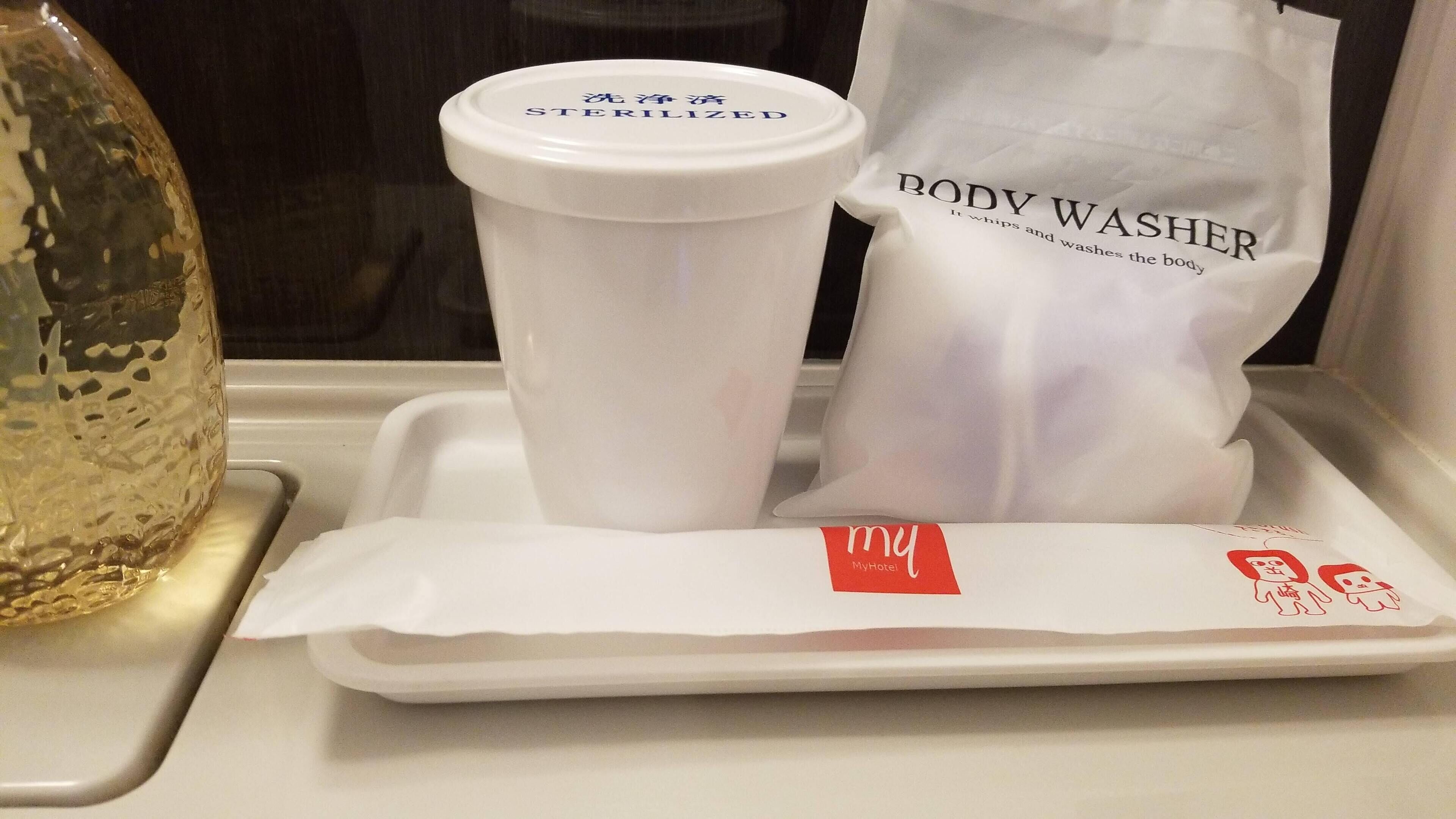 combined shower/bathtub, free toiletries, hair dryer, slippers