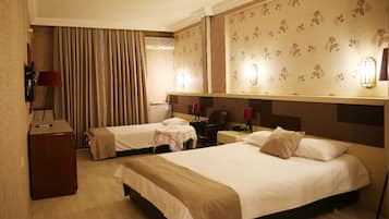 Triple Room | Premium bedding, minibar, in-room safe, desk