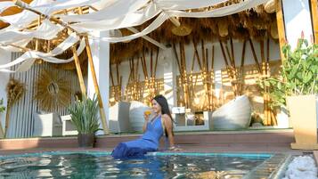 Outdoor pool, open 7:00 AM to 6:00 PM, pool umbrellas, sun loungers