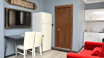 Family Apartment, 1 Bedroom, City View | 1 bedroom, premium bedding, free minibar items, blackout drapes