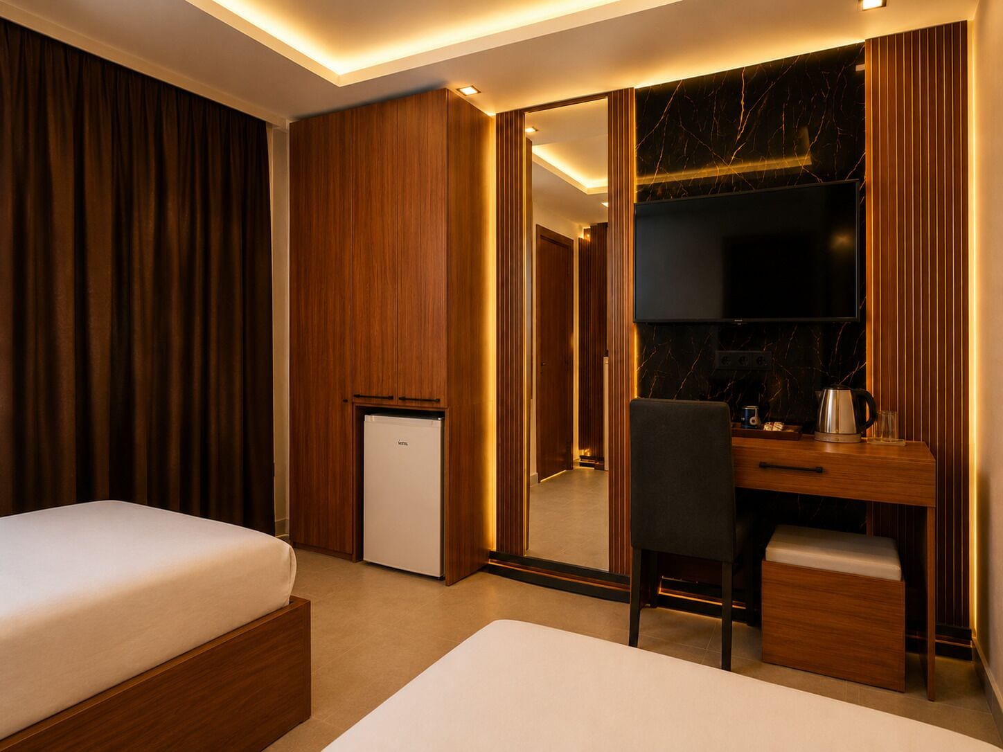 Egyptian cotton sheets, premium bedding, minibar (some free items), desk