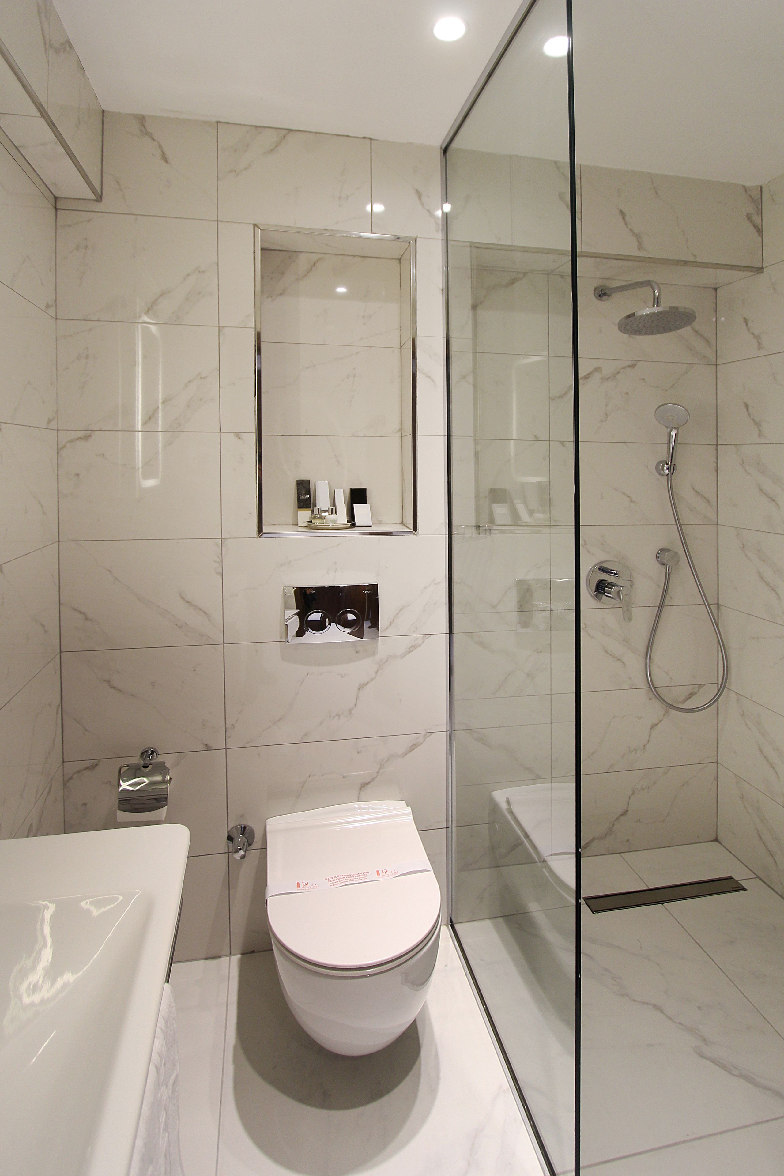 family suite | bathroom | shower, free toiletries, hair dryer, slippers
