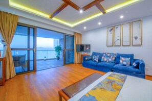 Suite, Sea View | Living area | TV